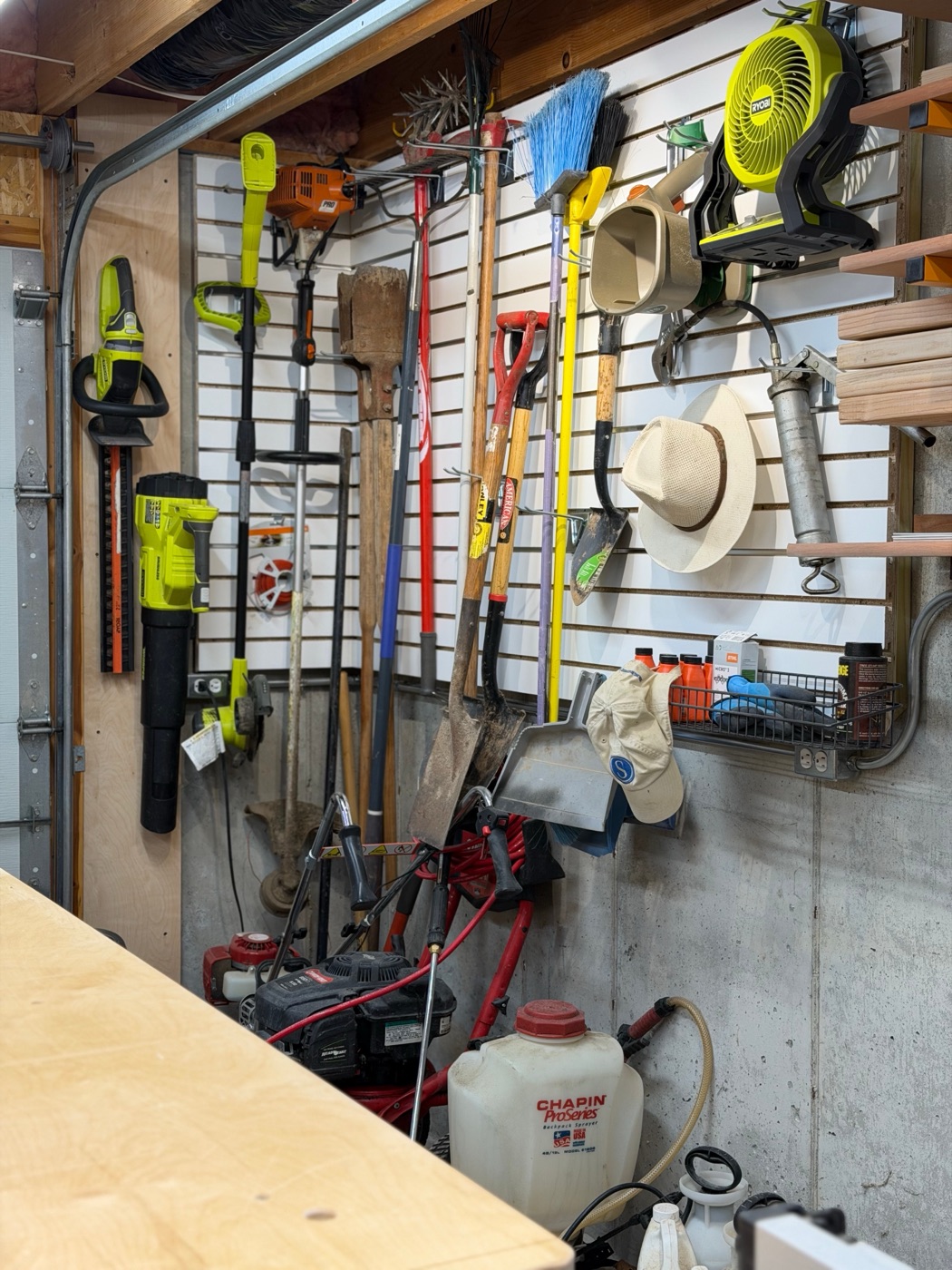 Slatwall with garden and yard tools