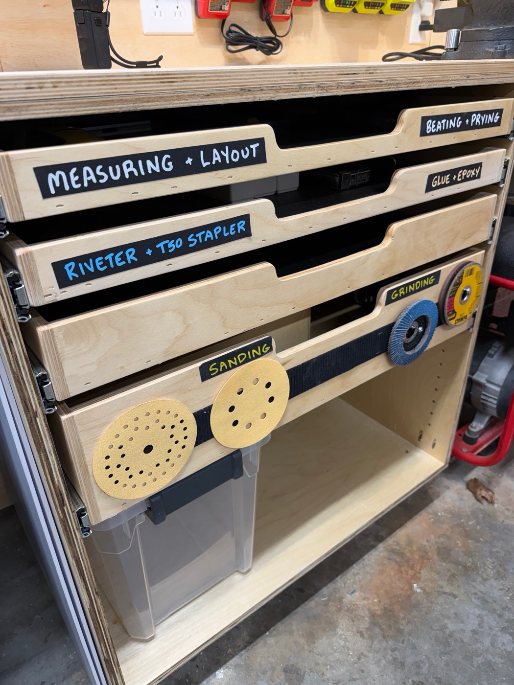 Workbench cabinet with labeled drawers