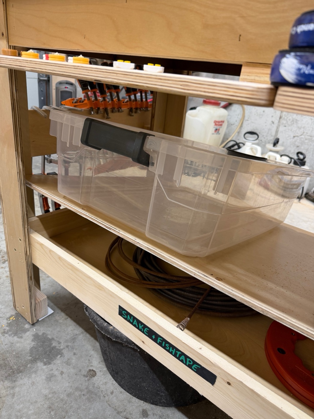 Labeled under-bench storage area