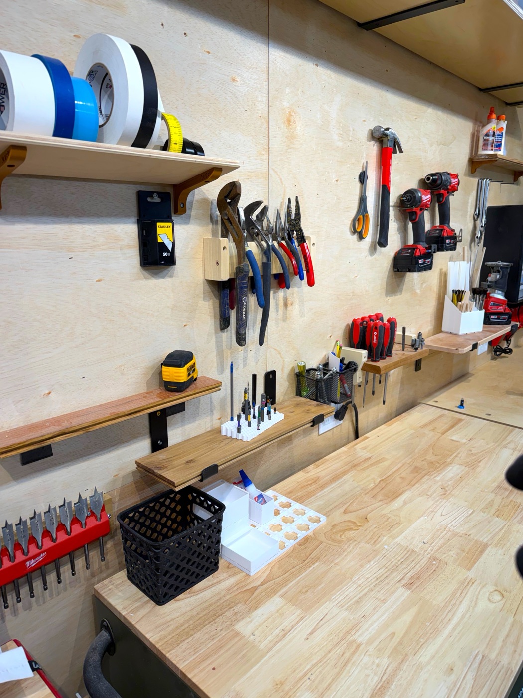 Tool wall with hand tools organized