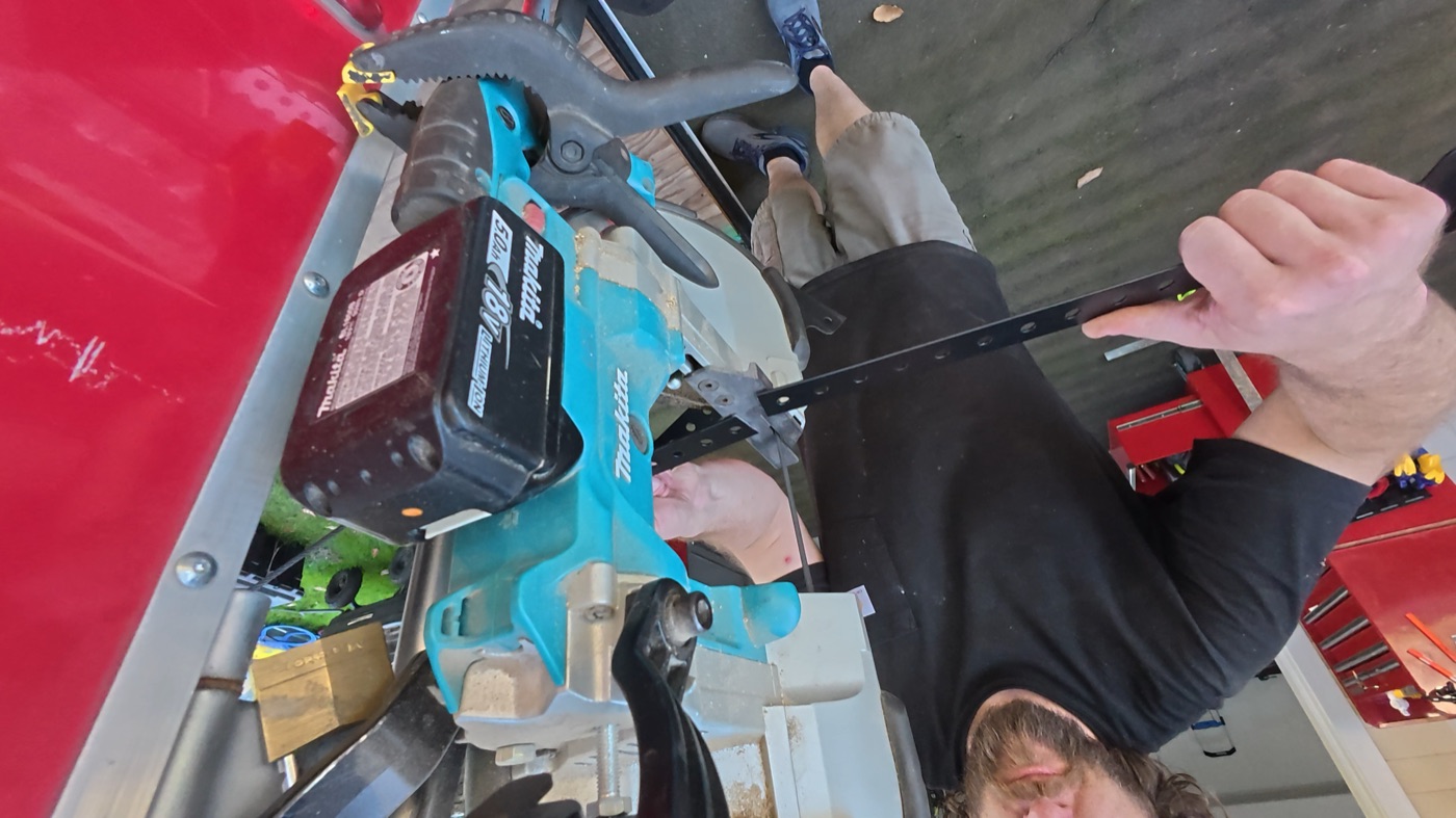 Using portable bandsaw mounted on trailer