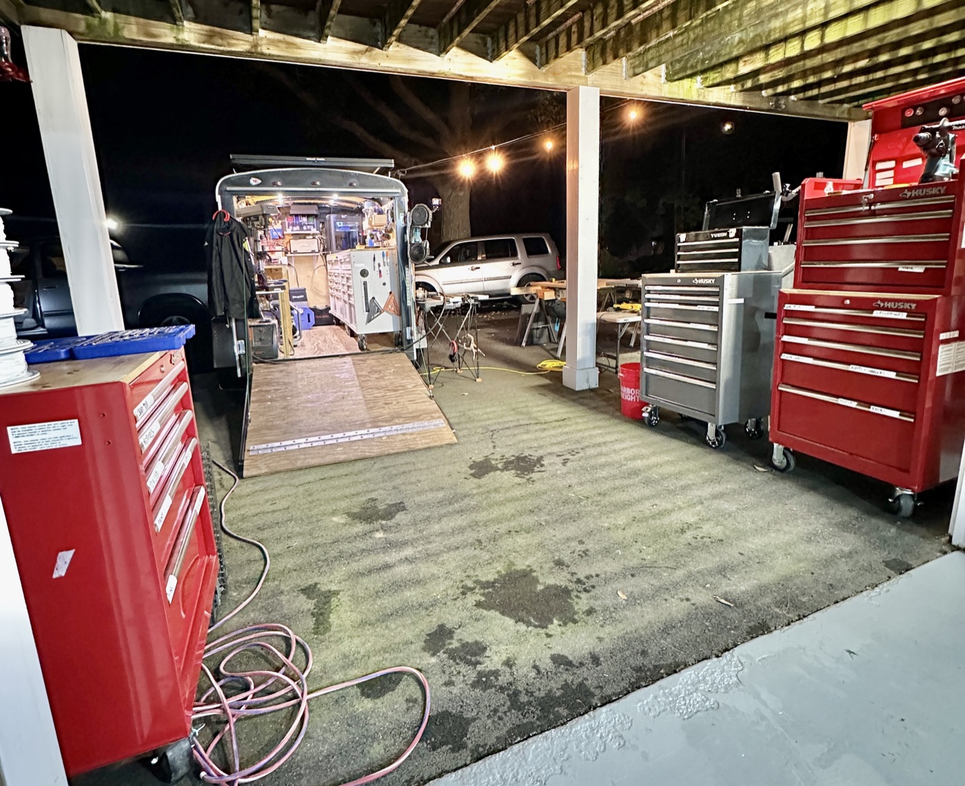 Trailer deployed with rolling tool chests